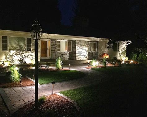 Low Voltage Landscape Lighting Along A Front Walkway By Bahler Brothers
