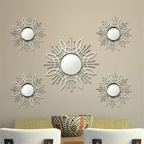 For example, they can be used in pieces and work of art as they usually reflect light and create new dimensions to space! Stratton Home Decor 5 Piece Burst Wall Mirror Set ...