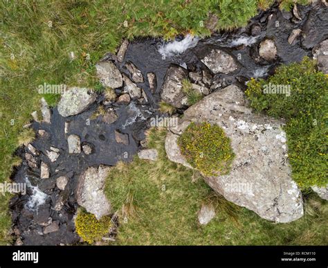 Drone Aerial View Landscape Of River Flowing Over Rocks And Down