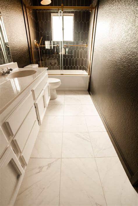 Tile trends for bathroom and powder room flooring. Hallway Bathroom Update: DIY Flooring Upgrade - THE BALLER ON A BUDGET - An Affordable Fashion ...