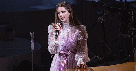 It's first come first serve. Lana Del Rey Faces Criticism Over Mesh Face Mask | Teen Vogue