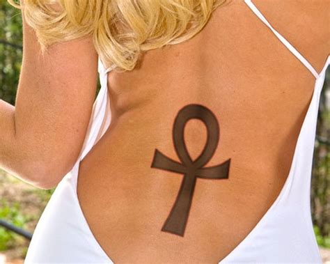 The egyptian cross should yield a good fortune and a long life, health and beauty to a person who makes this ink. Meaning and Design Ideas for Egyptian Ankh Tattoos