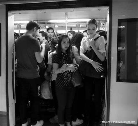 tofu photography a crowded train carriage in bangkok thailand