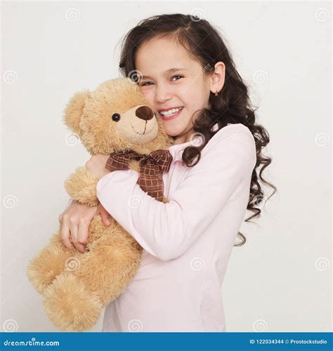 Cute Little Girl Hugging Teddy Bear Stock Photo Image Of Comfort