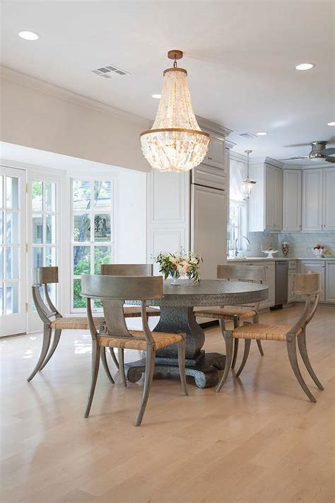 Maybe you would like to learn more about one of these? Round Zinc Dining Table with Gray Klismos Chairs ...