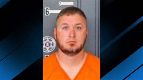 Police officer arrested, accused of planting evidence