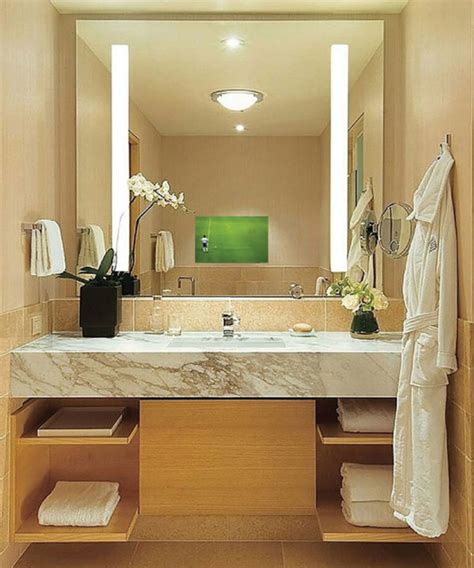 Relax & unwnd with bathroom vision. Fusion Lighted Mirror TV | Bliss Bath And Kitchen