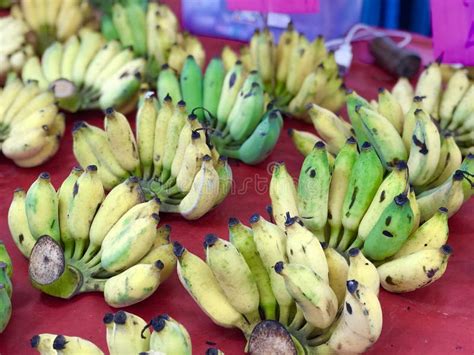 Banana Is Not Ripe Sold In The Fruit And Vegetable Market Stock Photo