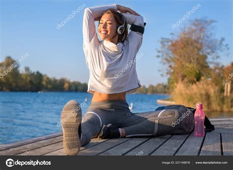 Beautiful Young Woman Working Out Water While Smiling Stock Photo By