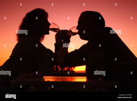 Silhouette Couple Drinking Wine Sunset Hi Res Stock Photography And