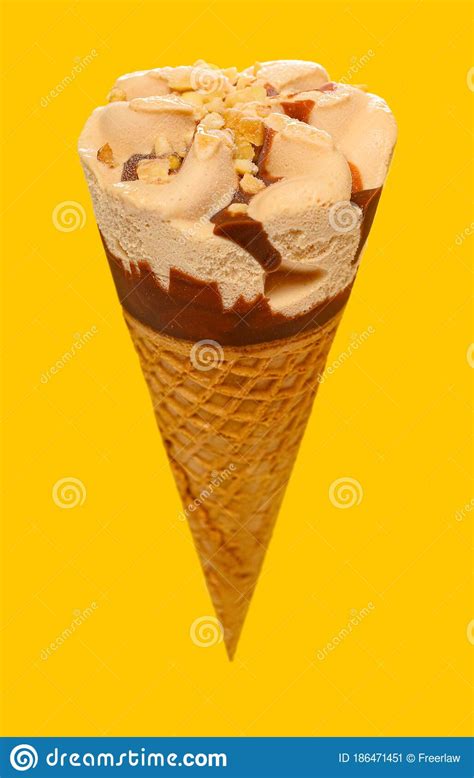 Ice cream cones all departments alexa skills amazon devices amazon global store amazon warehouse apps & games audible audiobooks baby beauty books car & motorbike cds & vinyl classical music clothing computers. Angle View Of Milk Tea Flavor Ice Cream Cone On A Yellow ...