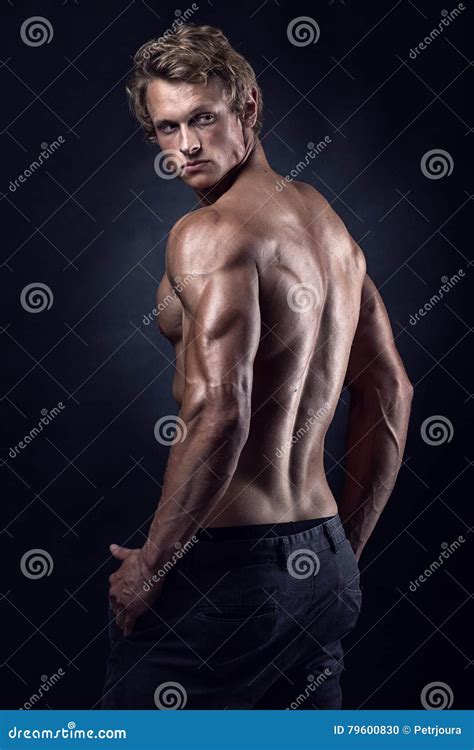 Strong Athletic Man Fitness Model Posing Back Muscles Stock Photo