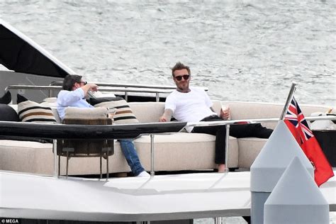 David Beckham Puts His Feet Up As He Joins Pal Dave Gardner And His