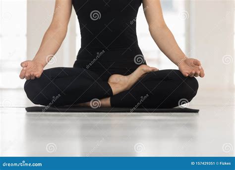 woman practicing yoga doing padmasana exercise lotus pose close up stock image image of