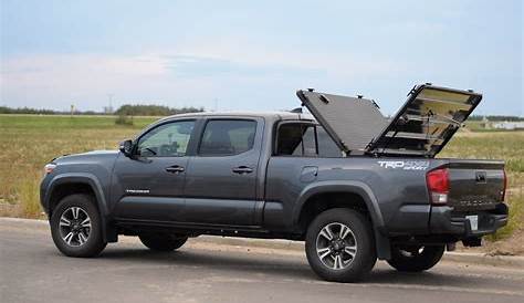 A Heavy Duty Truck Bed Cover On A Toyota Tacoma | A Rugged B… | Flickr