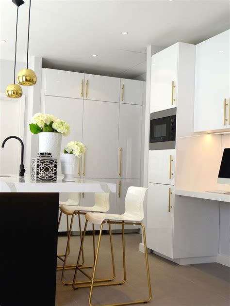 What approach are you considering to achieve the high gloss look? Trendy Kitchen with a Gold Hue - Give your Space a ...