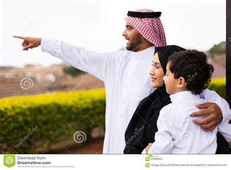 Use them in commercial designs under lifetime, perpetual & worldwide rights. Muslim Family Outside Pointing Stock Photo - Image of ...