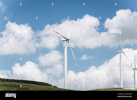 Windmills Against The Blue Sky Eco Friendly Energy Or Alternative