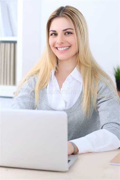 Young Business Woman Or Student Girl Sitting At Office Workplace With