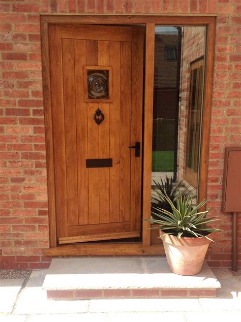 25 Spectacular Wooden Front Door Designs For Your Home Inspiration Traditional Front Doors