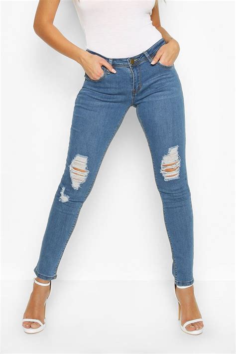 low rise ripped knee skinny jeans jeans outfit women womens jeans skinny jeans heels outfit