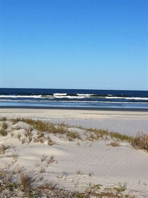 The large, sweeping sand dunes give the it a wild and remote feel, even though it's not far from nags head. Outer Banks, North Carolina | Favorite places, Places ive ...