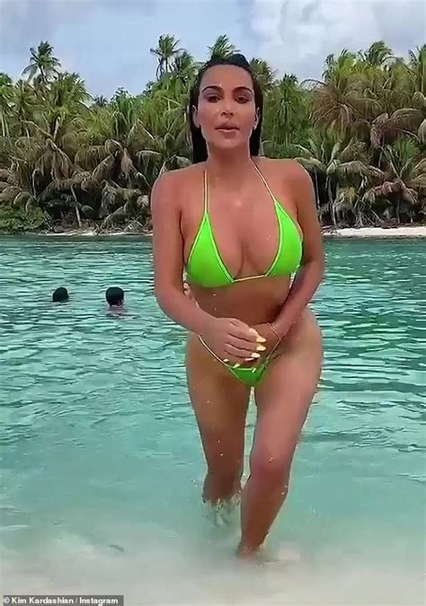 Kim Kardashian Displays Her Jaw Dropping Assets In A Slinky Neon Green Bikini During Recent