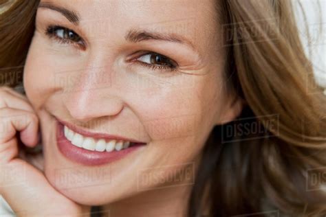 Close Up Of Womans Smiling Face Stock Photo Dissolve