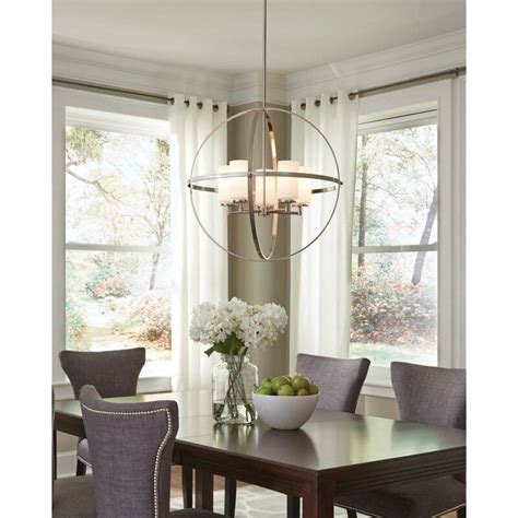 This chandelier stands out among decor with its bold statement and glamorous design. Raine 5 - Light Shaded Globe Chandelier in 2020 | Dining ...