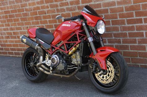 Testastretta technology allows a reduced angle between the intake and exhaust valves resulting in a clean, compact combustion chamber that is highly efficient. Ducati Monster S4R Motorcycle - Owned by Tim Allen