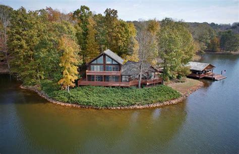 .other toys and a covered carport. Top Lake Houses for Sale
