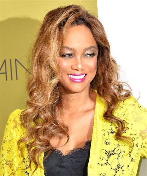 Tyra Banks Long Wavy Golden Hairstyle With Side Swept Bangs And