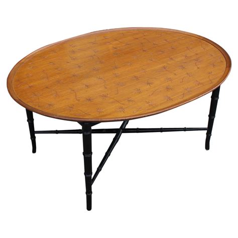 Baker furniture mahogany banded inlay oval coffee table with extensions. Kittinger Incised Coffee Table with Faux Bamboo Legs at ...