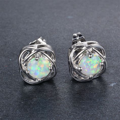 Make a statement with gold jewelry. Sweet Four Claw White Fire Opal Stud Earrings Women's ...