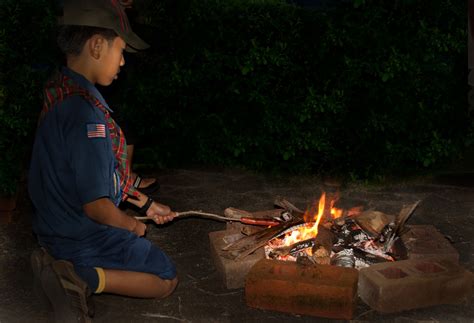 Cub Scout At Campfire