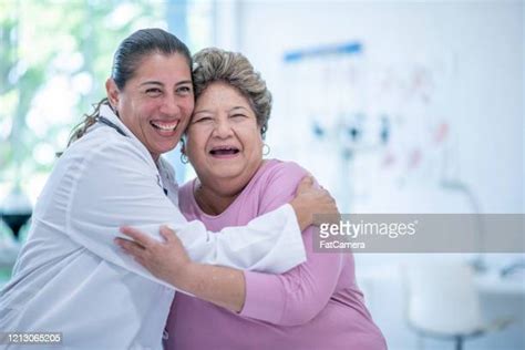 Female Doctor Hugging Patient Photos And Premium High Res Pictures Getty Images