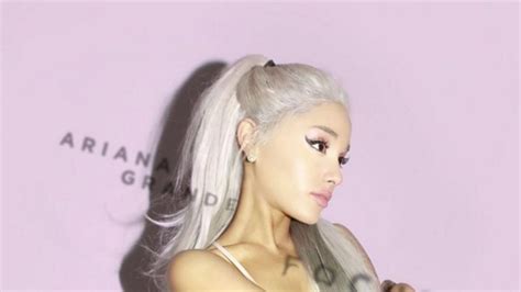 watch ariana grande rock platinum hair and killer dance moves in her new focus music video