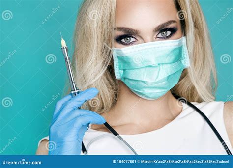 Blond Nurse In Glasses Holding A Stethoscope Stock Image Image Of Care Gloves 104077801