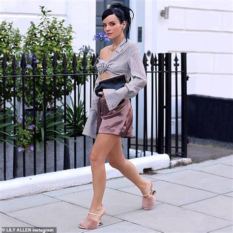 lily allen wears mini shorts and quirky asymmetric shirt as she poses for her latest instagram