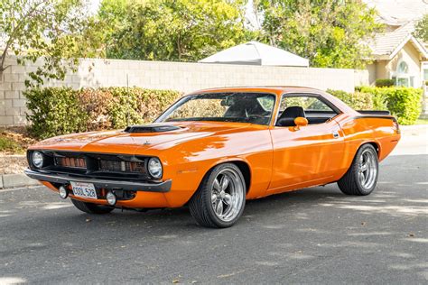 1970 Plymouth Cuda Is Hemi Orange Perfection Packs A Big Surprise