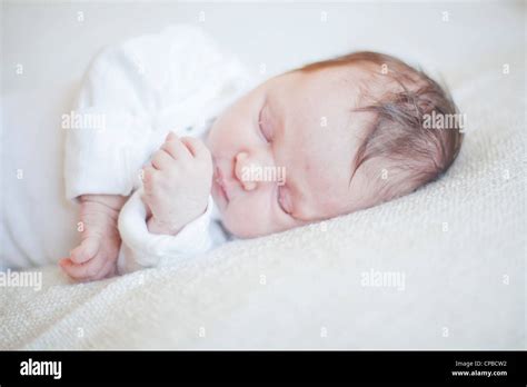 Portrait Of A Cute Newborn Baby Girl Sleeping Stock Photo Alamy