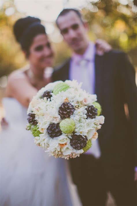 Wedding photos with pine cone bouquets. Bride cone pine bouquet | Wedding flowers, Wedding, Bouquet
