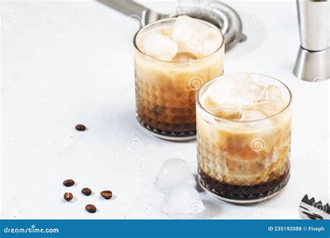 white russian cocktail trendy alcoholic drink with vodka coffee liqueur cream and ice gray
