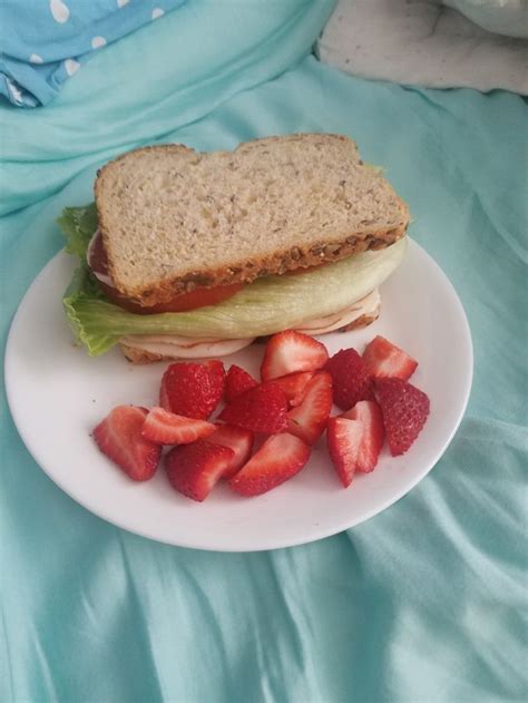 Turkey Sandwich With Lettuce Tomato Mayo And Provolone Cheese With