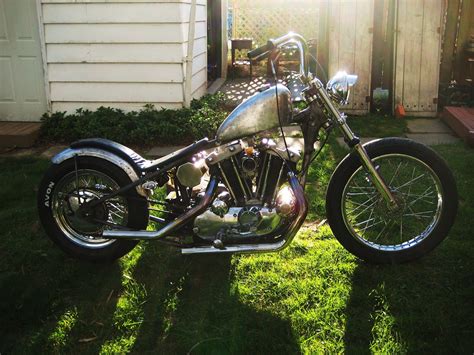 Custom built iron head sportster bike is in great shape and is all customised gorgeous blue metal flake with custom brushed spider webs and pin striping motor covers are powder coated very pretty litt. Motor League: -1977 Harley Sportster- SOLD