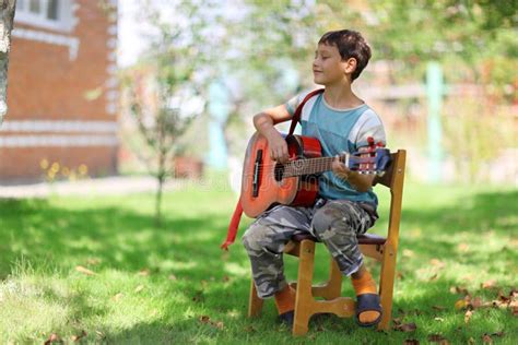 Music Student Playing The Guitar Stock Photo Image Of Leisure