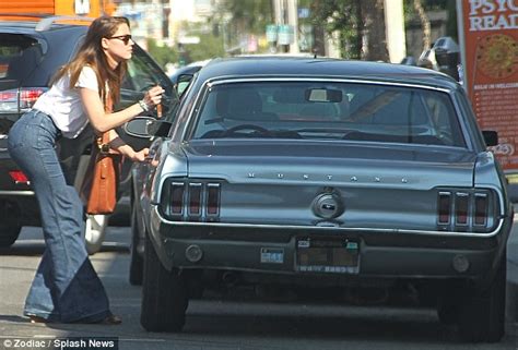 Amber Heard Wears Flared Jeans As She Takes A Ride In Her