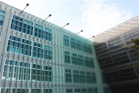 Building Facade And Fixed Vertical Glass Louvers Glasscon
