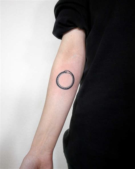 Simple Ouroboros Tattoo By Ann Gilberg Tattooed On The Right Forearm