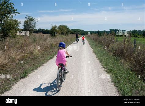 A family cycle through nature in rural france and explore the landscape